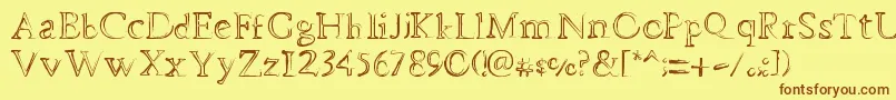 フォントDheMysteriFull – 茶色の文字が黄色の背景にあります。