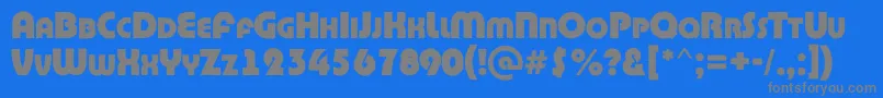 ABighaustitulrgExtrabold-fontti – harmaat kirjasimet sinisellä taustalla
