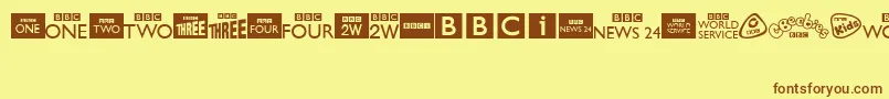 フォントBbcTvChannelLogos – 茶色の文字が黄色の背景にあります。