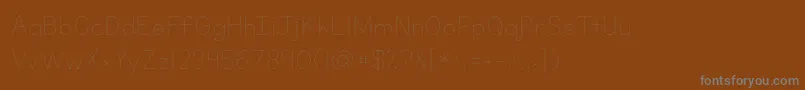 Kgprimarydots-Schriftart – Graue Schriften auf braunem Hintergrund