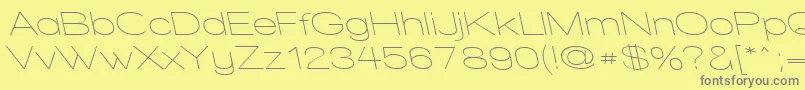フォントWalkwayExpandRevoblique – 黄色の背景に灰色の文字