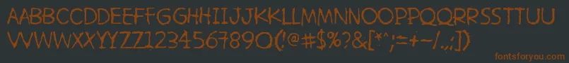 Шрифт HetkeaMyohemmin – коричневые шрифты на чёрном фоне