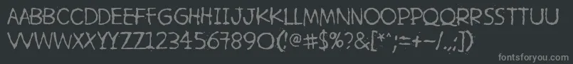 Шрифт HetkeaMyohemmin – серые шрифты на чёрном фоне