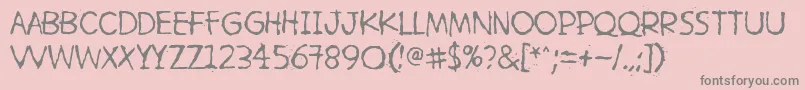 フォントHetkeaMyohemmin – ピンクの背景に灰色の文字