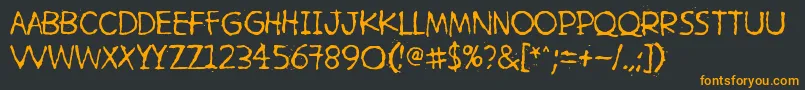 フォントHetkeaMyohemmin – 黒い背景にオレンジの文字