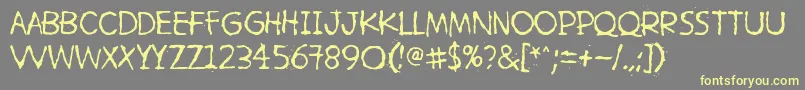 HetkeaMyohemmin-Schriftart – Gelbe Schriften auf grauem Hintergrund