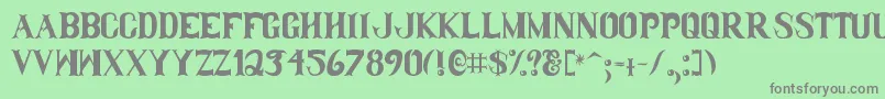 フォントClamDip – 緑の背景に灰色の文字