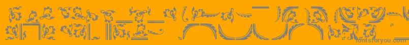 Ornamentstwossk-Schriftart – Graue Schriften auf orangefarbenem Hintergrund