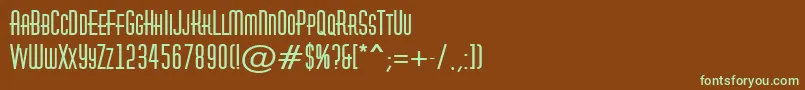フォントAHuxleycapsBold – 緑色の文字が茶色の背景にあります。