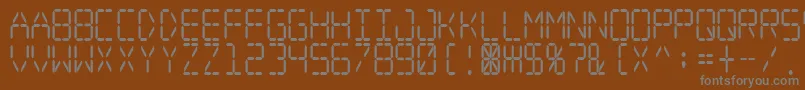 フォントDigitaldreamnarrow – 茶色の背景に灰色の文字