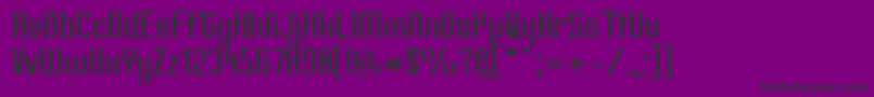 フォントKandiduw – 紫の背景に黒い文字