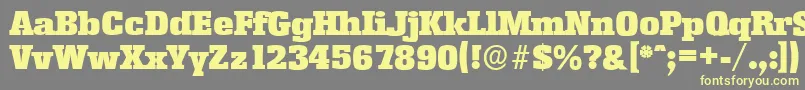 EnschedeserialBlackRegular-fontti – keltaiset fontit harmaalla taustalla