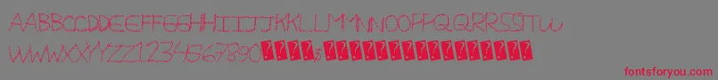 Więcej informacji o czcionce Magicscribble Czcionka Magicscribble – czerwone czcionki na szarym tle