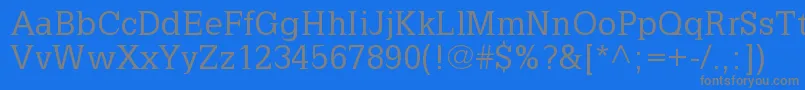 フォントLatinia – 青い背景に灰色の文字