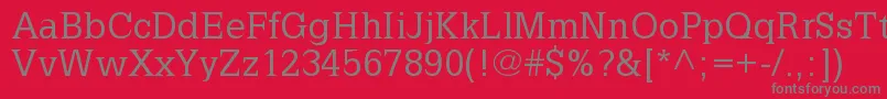 フォントLatinia – 赤い背景に灰色の文字