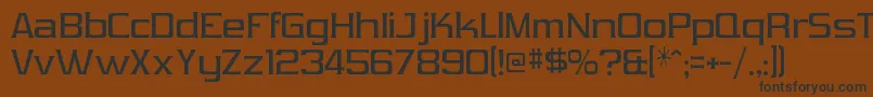 VibrocentricRegular Font – Black Fonts on Brown Background