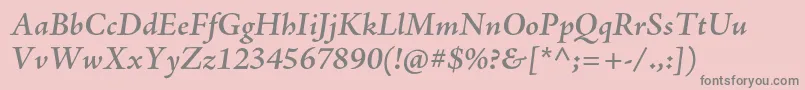 フォントAjensonproSemiboldit – ピンクの背景に灰色の文字