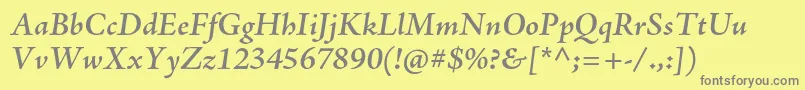 AjensonproSemiboldit-fontti – harmaat kirjasimet keltaisella taustalla