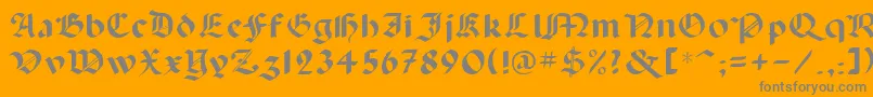 Lancas-Schriftart – Graue Schriften auf orangefarbenem Hintergrund