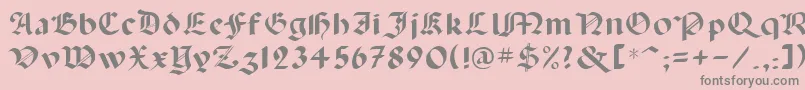 Lancas-fontti – harmaat kirjasimet vaaleanpunaisella taustalla