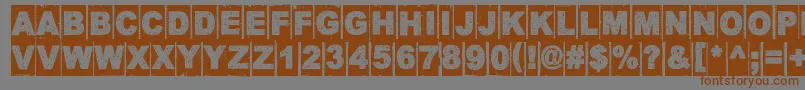 フォントCornerDarkDistance – 茶色の文字が灰色の背景にあります。