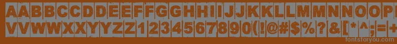 CornerDarkDistance-Schriftart – Graue Schriften auf braunem Hintergrund