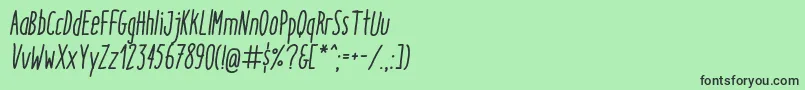 フォントItaloMediumItalic – 緑の背景に黒い文字