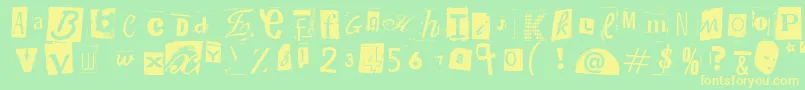 WoodcutterAnonymousPart2 Font – Yellow Fonts on Green Background