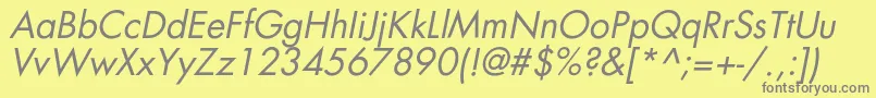 フォントAgfatumcItalic – 黄色の背景に灰色の文字