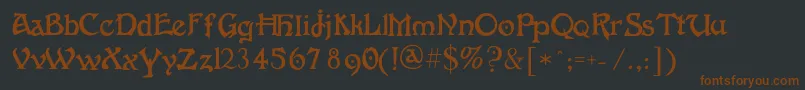 Шрифт Fantaisieartistique – коричневые шрифты на чёрном фоне