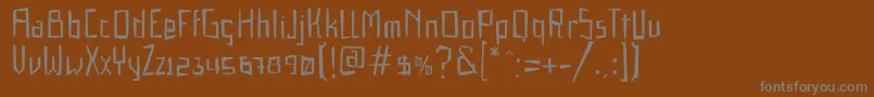 フォントGabardinaRegular – 茶色の背景に灰色の文字