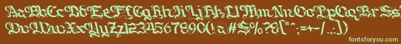 フォントGotique – 緑色の文字が茶色の背景にあります。