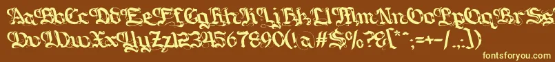 Gotique-fontti – keltaiset fontit ruskealla taustalla
