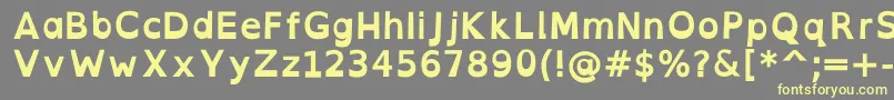 OpendyslexicaltaBold-fontti – keltaiset fontit harmaalla taustalla