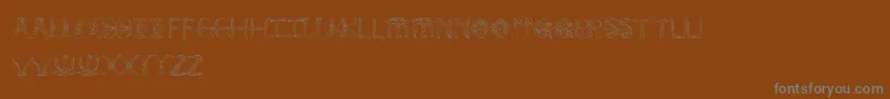 AndersonEmpress2-Schriftart – Graue Schriften auf braunem Hintergrund