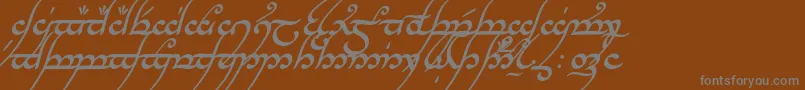 TengwarAnnatarBoldItalic-Schriftart – Graue Schriften auf braunem Hintergrund