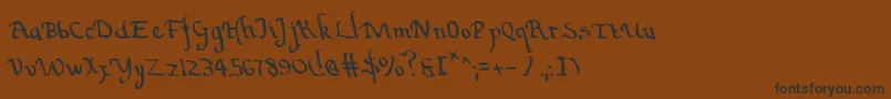 ValleyForgeLeftalic Font – Black Fonts on Brown Background