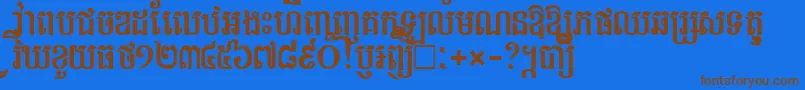 フォントTapromNew – 茶色の文字が青い背景にあります。