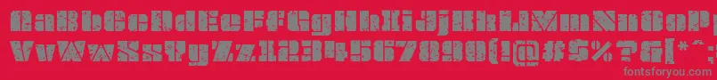 Шрифт OvrkllGrunge – серые шрифты на красном фоне