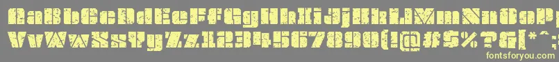 OvrkllGrunge-Schriftart – Gelbe Schriften auf grauem Hintergrund