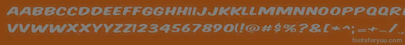 Komtitwr Font – Gray Fonts on Brown Background