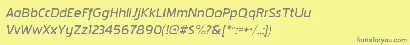 フォントPakenhamxpbkItalic – 黄色の背景に灰色の文字