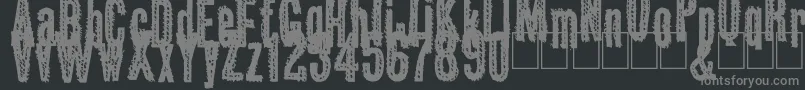 フォントOkas – 黒い背景に灰色の文字