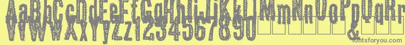 Okas-Schriftart – Graue Schriften auf gelbem Hintergrund