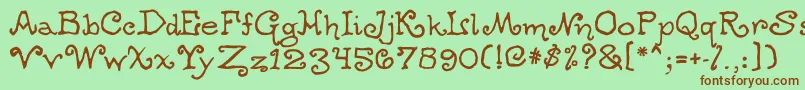 Ogdredweary-Schriftart – Braune Schriften auf grünem Hintergrund