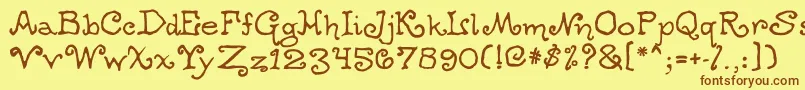 Ogdredweary Font – Brown Fonts on Yellow Background