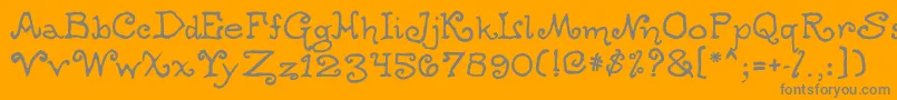 Ogdredweary-fontti – harmaat kirjasimet oranssilla taustalla