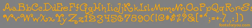 フォントOgdredweary – オレンジの文字は灰色の背景にあります。