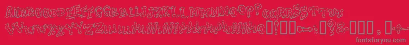 フォントDongCasual – 赤い背景に灰色の文字