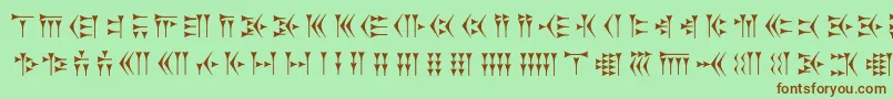 Zarathustra Font – Brown Fonts on Green Background